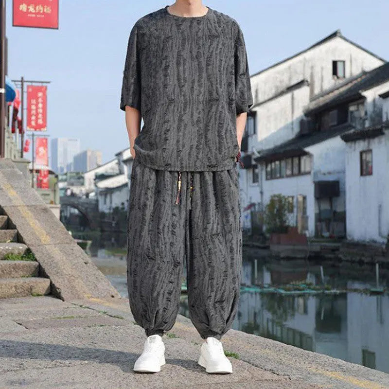 Men's thin knit short-sleeve suit with loose cropped trousers in black and grey colour options