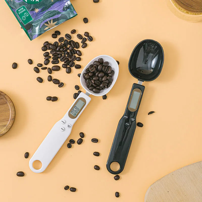 Digital spoon kitchen scale with LCD display showing weight measurement in grams