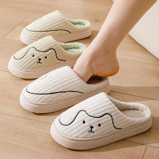 Cozy cat-themed slippers with plush uppers and non-slip rubber soles, available in a variety of vibrant colors