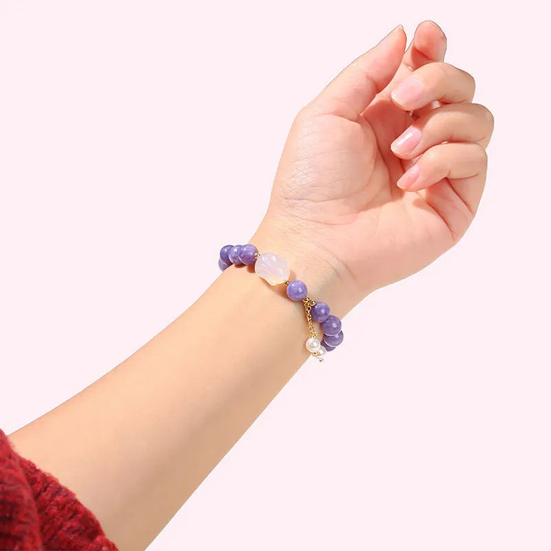 Purple geometric aquamarine and agate bracelet with round beads in handcrafted design