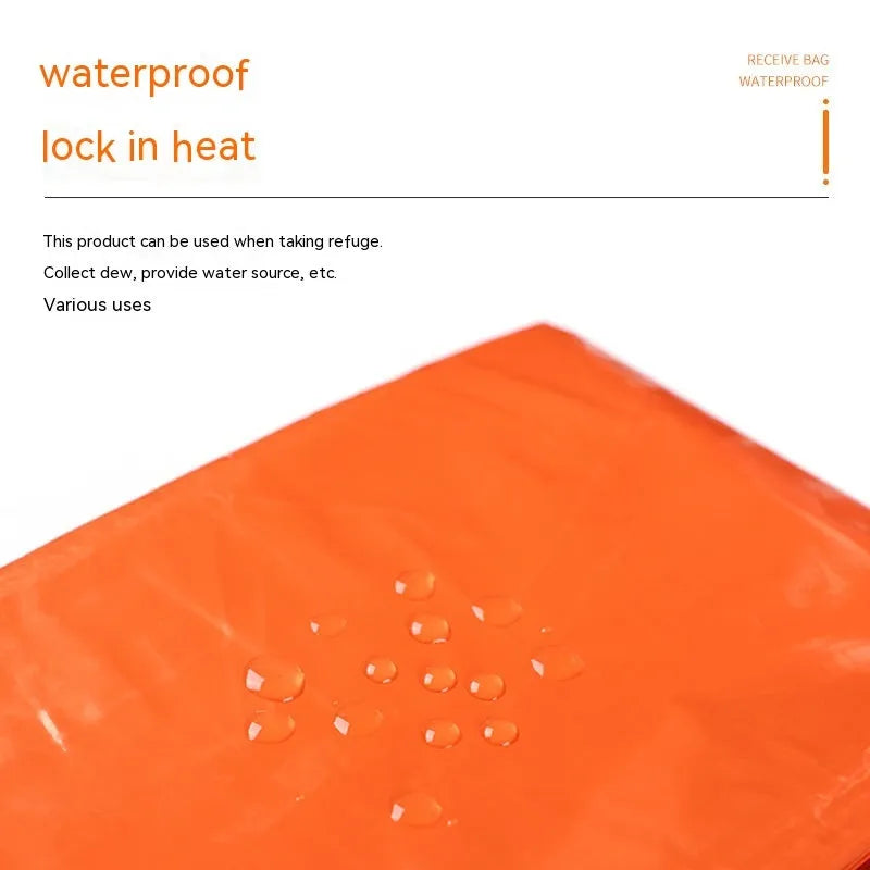 Emergency disaster relief tent kit with orange tent, sleeping bag, raincoat and safety whistle