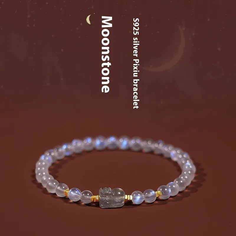 National style moonstone bracelet with animal zodiac design showing blue light fashion effect