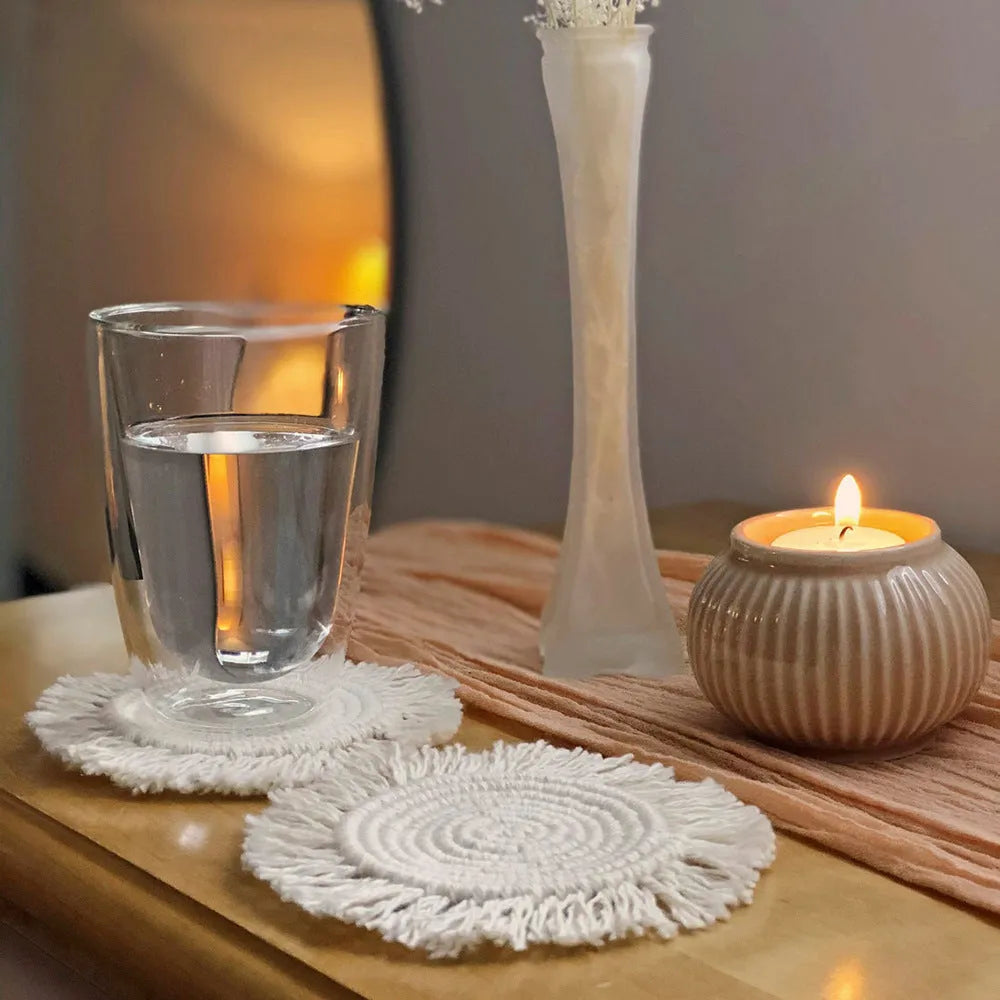 Hand-woven round beige cotton string coaster on a wooden surface, 15x15cm size option