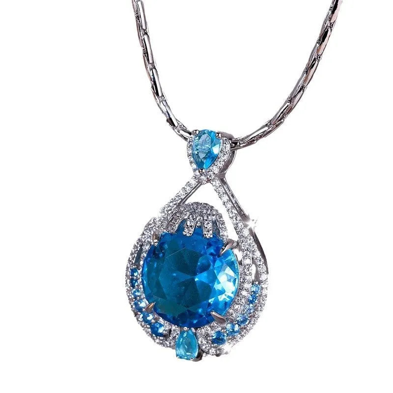 Blue crystal geometric necklace with fireworks cut gemstone on water wave chain
