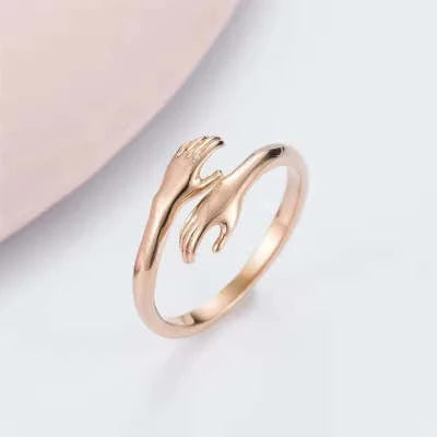 Adjustable Alloy Hands Hug Ring in silver and gold with geometry design