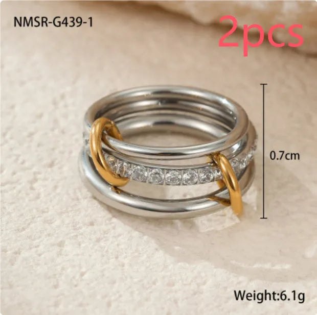 Stacked colour matching stainless steel rings with 18K gold plating in free size format