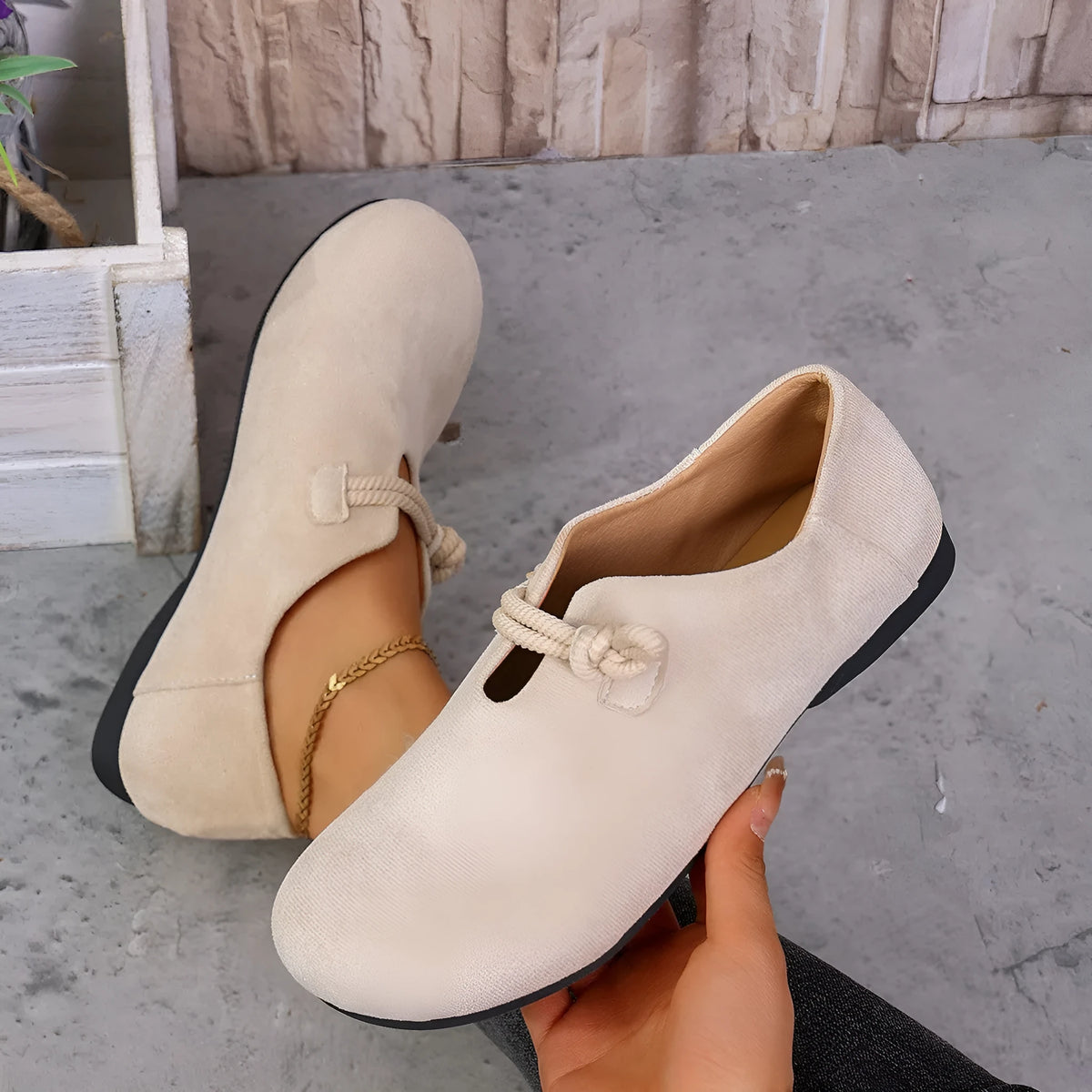 Round head slip-on solid colour flat shoes with suede upper and low rubber sole in beige colour