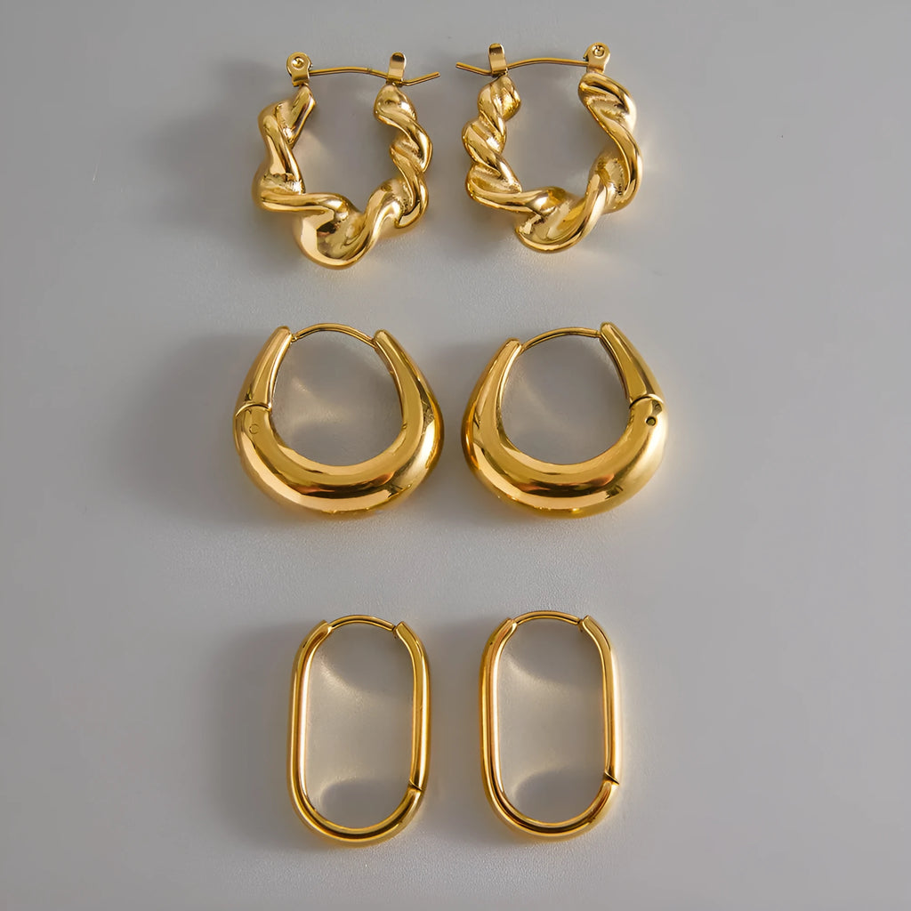 18K gold titanium steel geometric ellipse ear clip for women, light luxury style, on a model