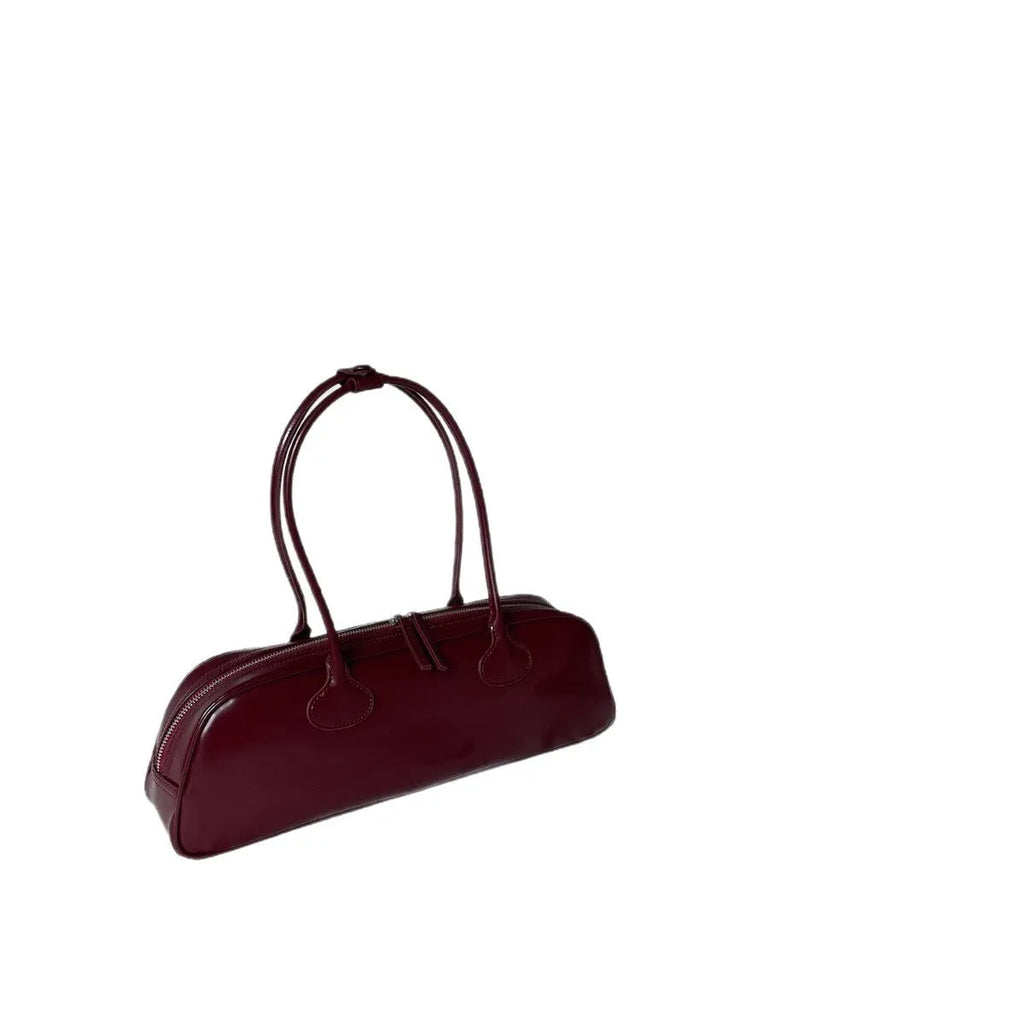 Women's genuine leather first layer cowhide oval single-shoulder bag in Brownie Brown colour with sewing thread detailing