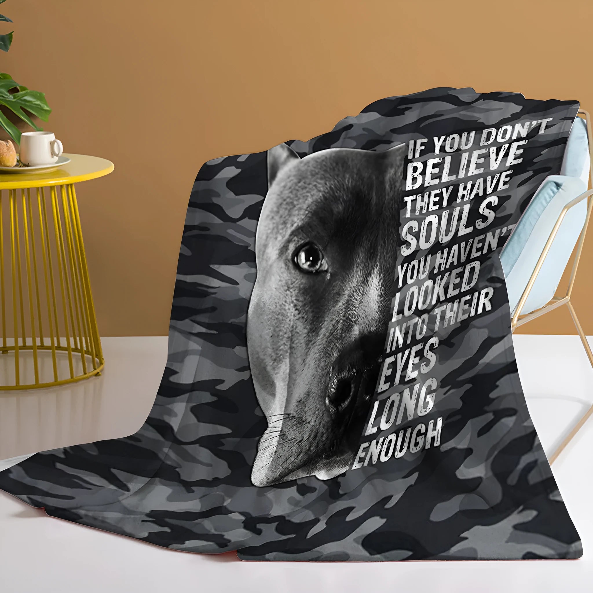Flannel black background dog pet theme soft printed blanket folded on a sofa
