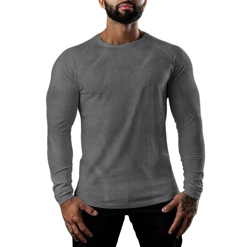 Men's long sleeve cotton sports t-shirt in tight fit with round neck, available in multiple colours