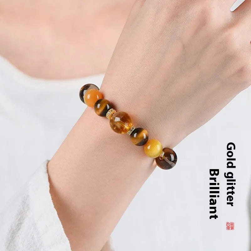 Natural yellow artificial crystal bracelet with 10mm tower beads on wrist