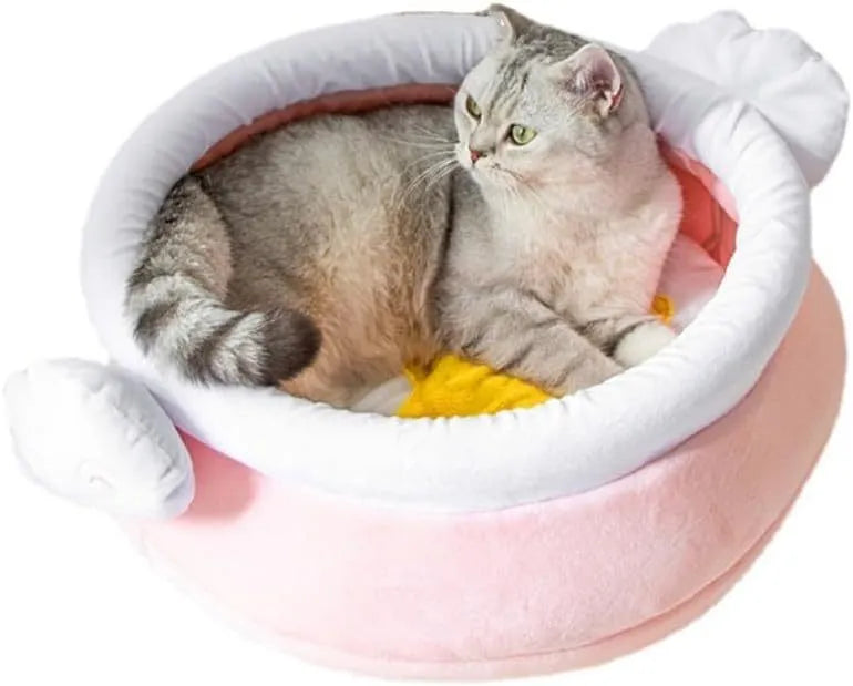 Pink honey pot-shaped cat sofa bed with a magic wand, showing a removable cushion inside.