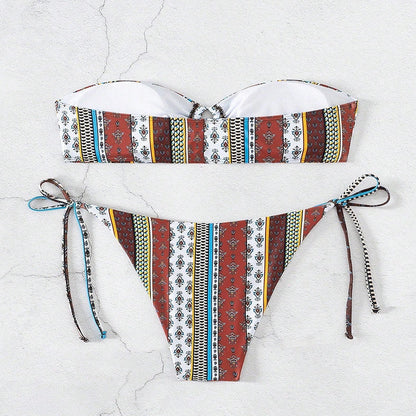 Women's mixed colour swimsuit with front lace-up ties and split leg design