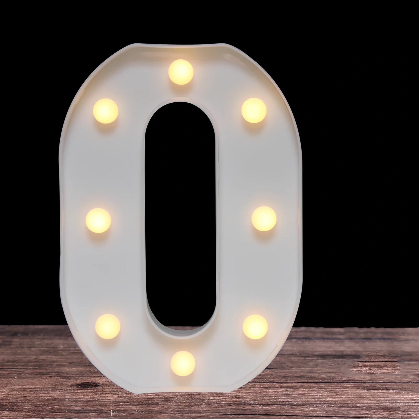 White plastic LED alphabet marquee sign with warm white illumination, 22cm height with battery operation