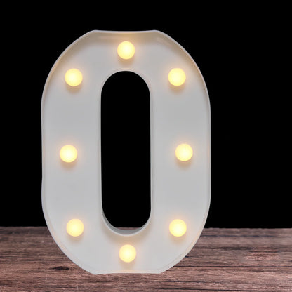 White plastic LED alphabet marquee sign with warm white illumination, 22cm height with battery operation