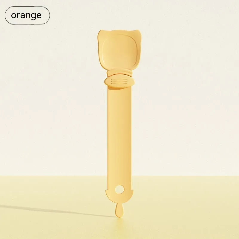 Cat strip squeezing machine in beige, 27x6.5cm HIPS plastic extruder on a countertop