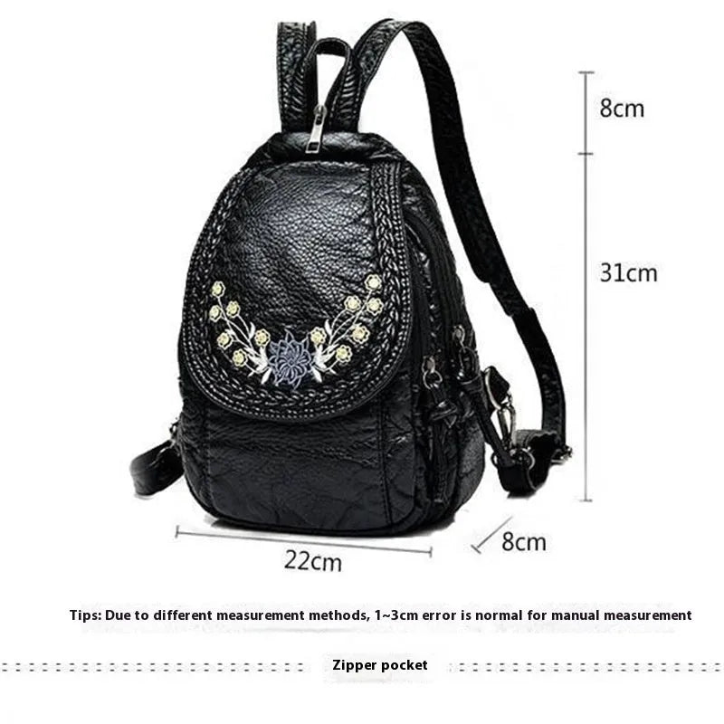 Soft PU leather dual-use chest backpack for ladies in black with visible sewing thread and zippered compartments