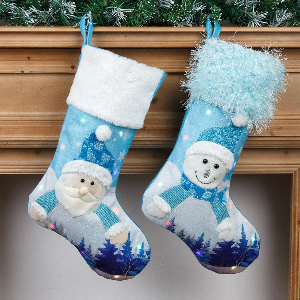 Magical luminous Christmas socks with Santa Claus and Snowman designs, featuring warm, glowing lights for festive holiday home decor