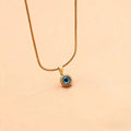 Angel Eyes titanium steel necklace with gold plating and coloured glaze eye pendant on snake bones chain