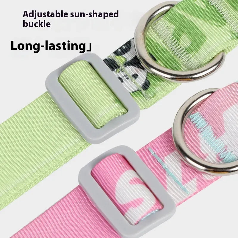 Green and colour gradient adjustable nylon dog collar with cartoon pattern, shown with buckle.