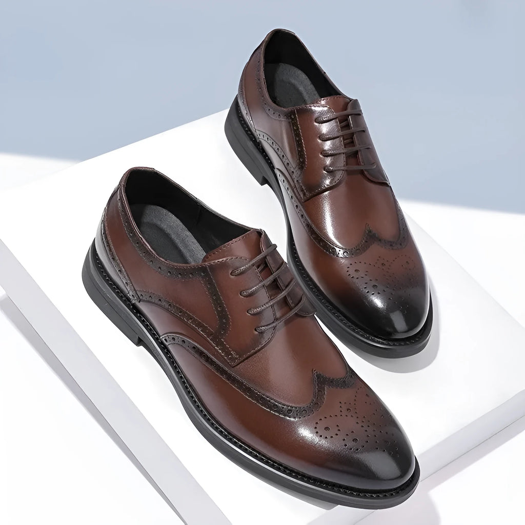 Men's black and brown brogue leather shoes with traditional perforated detailing