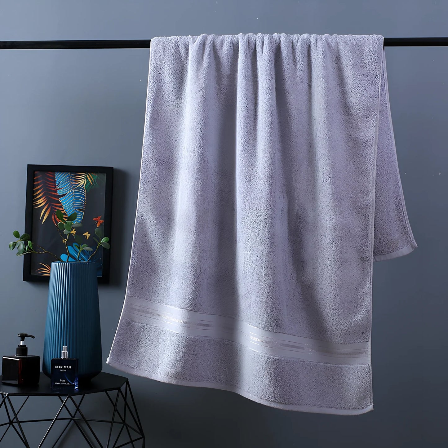 Three-piece cotton bath towel set in blue, featuring 70x150cm bath towel, 34x75cm hand towel, and 34x35cm square scarf for absorbent drying