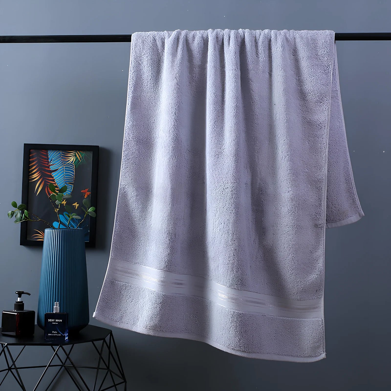 Three-piece cotton bath towel set in blue, featuring 70x150cm bath towel, 34x75cm hand towel, and 34x35cm square scarf for absorbent drying