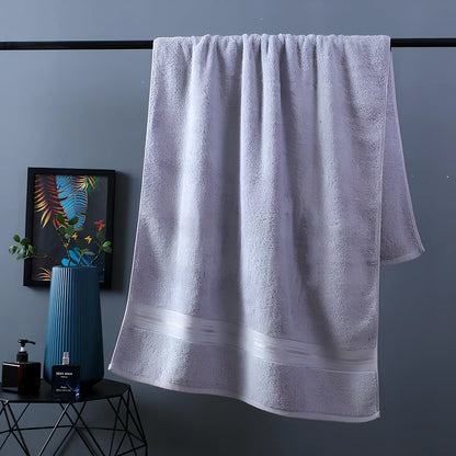 Three-piece cotton bath towel set in blue, featuring 70x150cm bath towel, 34x75cm hand towel, and 34x35cm square scarf for absorbent drying