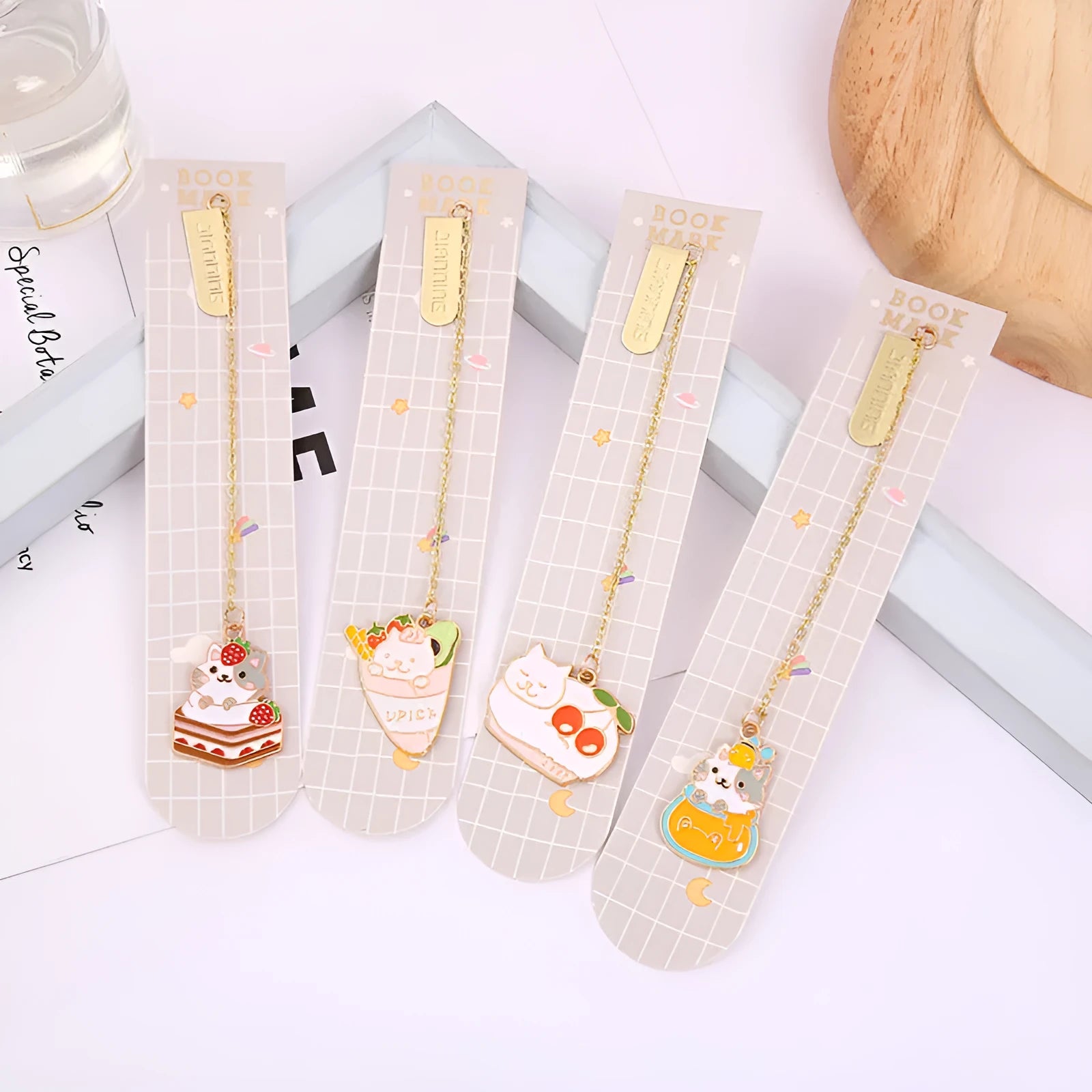 Creative cat design metal bookmark measuring 3.8cm by 18.3cm with four colour variations