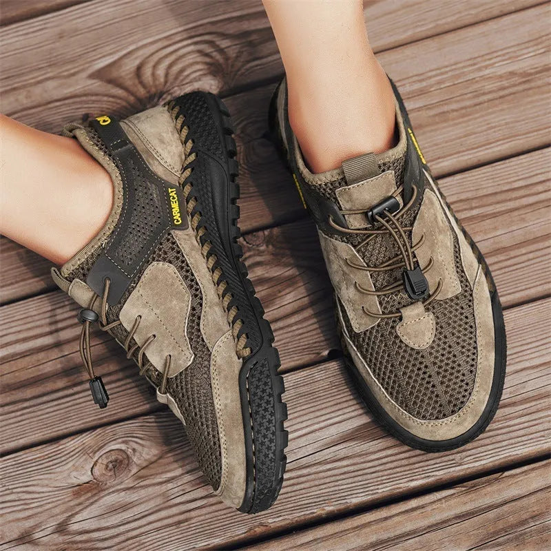 Men's brown suede casual tennis shoes with elastic band and hand-stitched details.