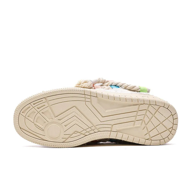Creamy white retro skate shoes with old damage lace detailing and rubber soles