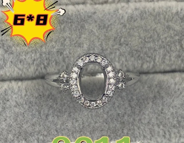 Oval denier ring with open mouth design showing 6*8mm main stone and five-pointed star decoration