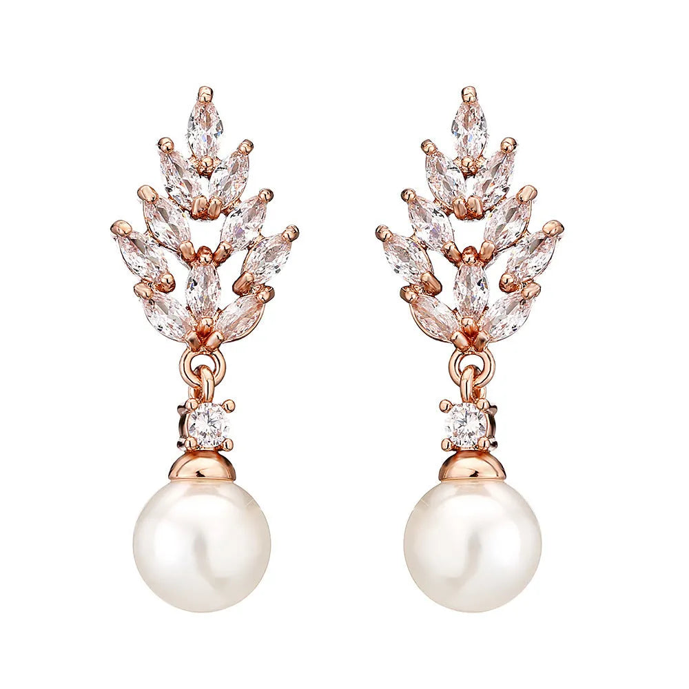 Geometric flower earrings with micro inlaid zircon stones and pearl elements in three plating colours