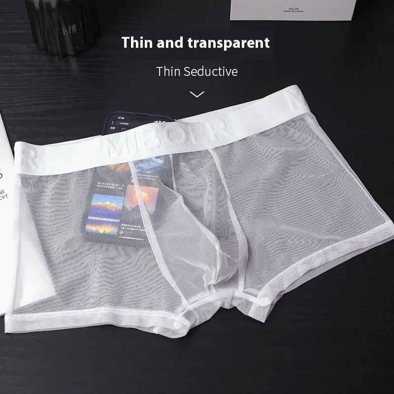 Men's thin invisible boxers in six colours including black, white, sapphire blue, skin colour, green and pink