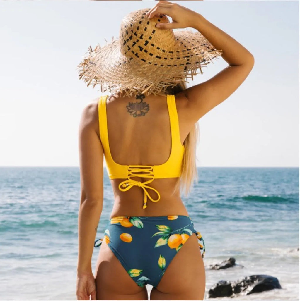 Yellow nylon cotton blend high elasticity bikini swimsuit for women, sleeveless brief style