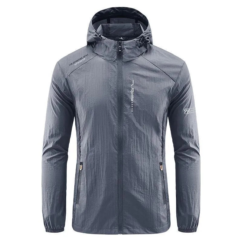 Man wearing a lightweight grey hooded nylon jacket for summer sun protection