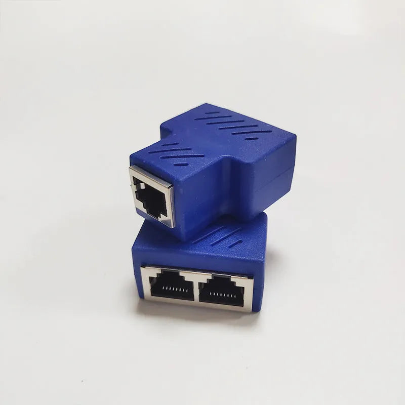 White RJ45 three-way network cable splitter adapter with one input and two output ports.