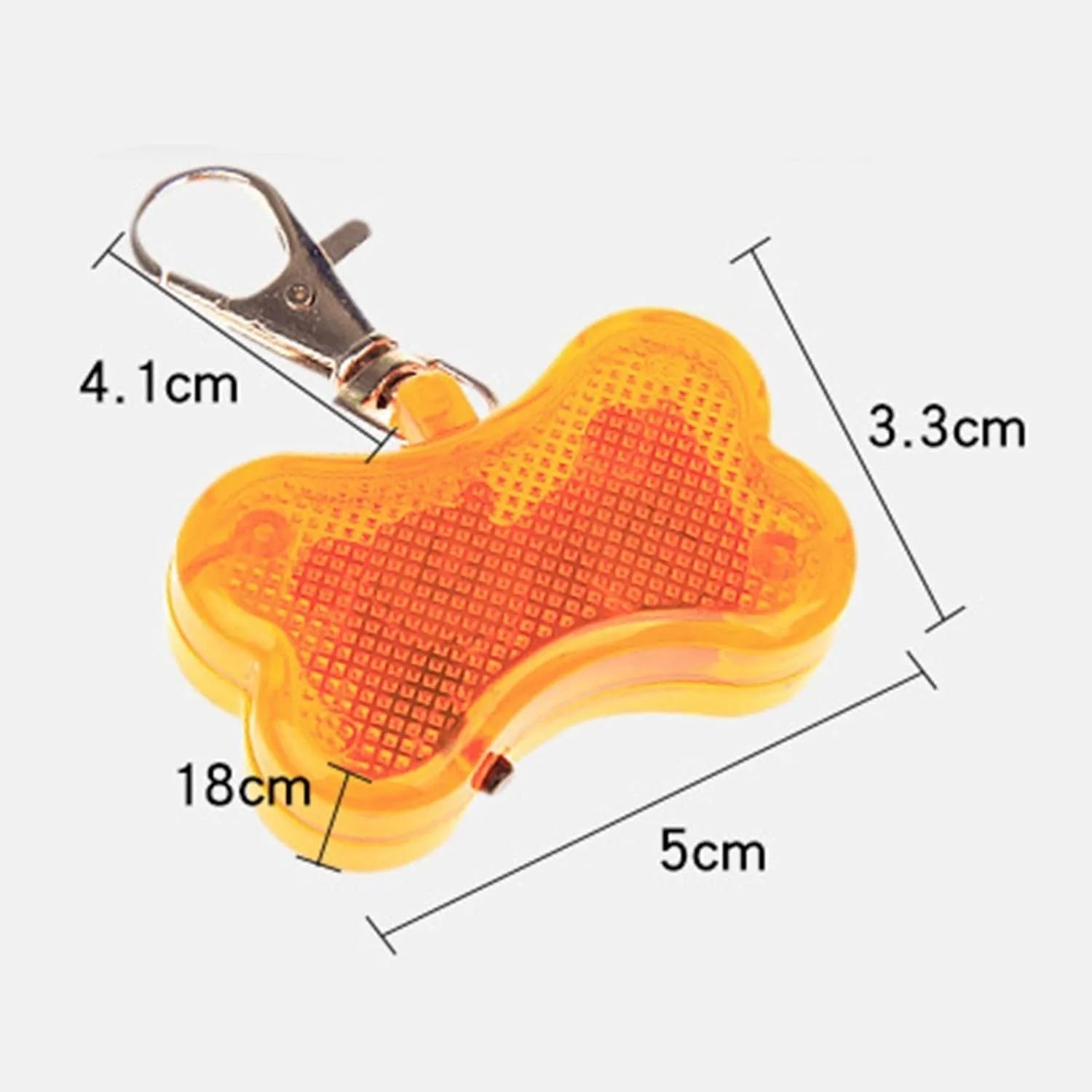 Bone-shaped LED luminous pendant for a pet collar showing blue light, next to two LR44 batteries.