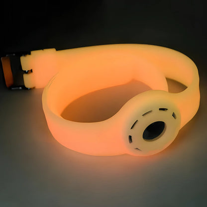 Red silicone AirTag tracker collar wrapped on pet neck, adjustable armband in solid colour for anti-lost security