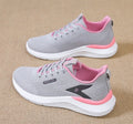 Low-top women's casual running shoes in beige with mesh upper, round toe, and front lace-up closure