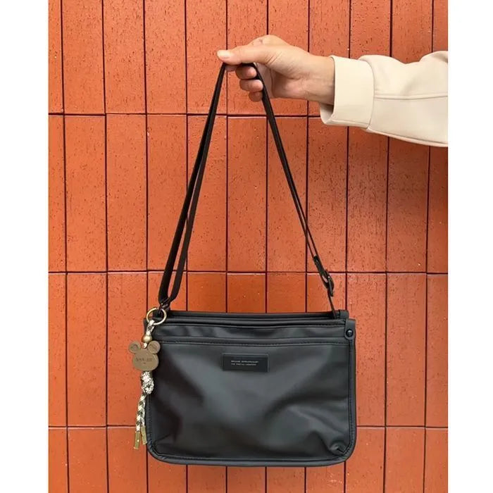 Small square crossbody bag in trendy cool colour made from Oxford cloth with shoulder strap