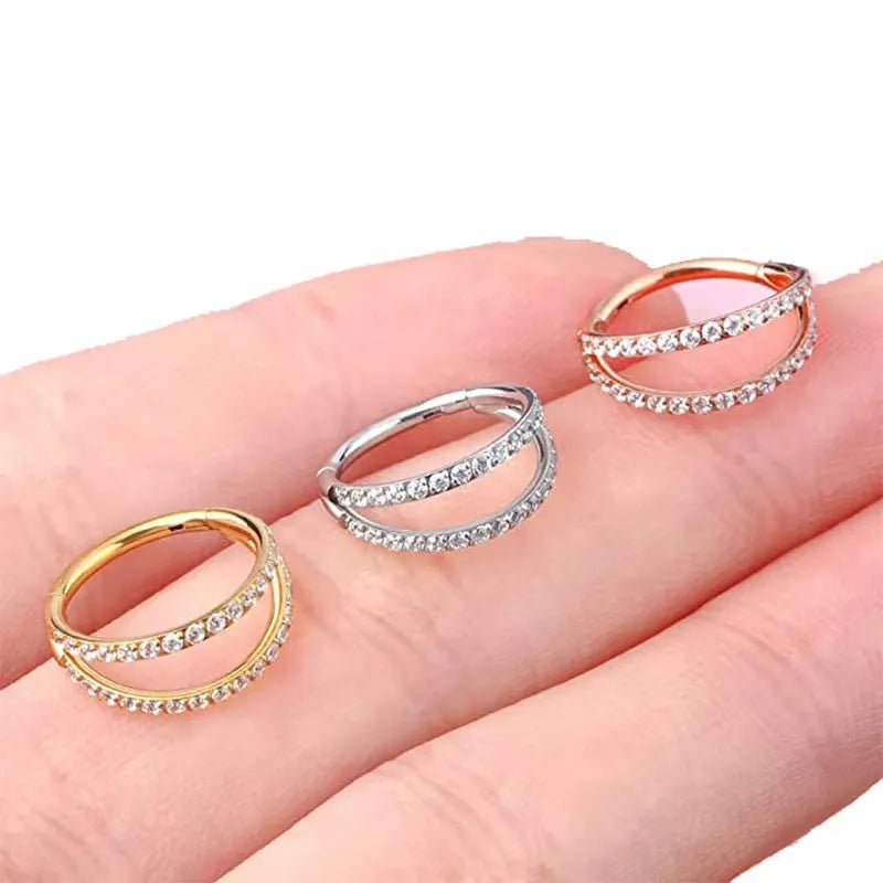 Titanium alloy nose ring with G23 purity and diamond-treated zircon surface in gold or steel colour