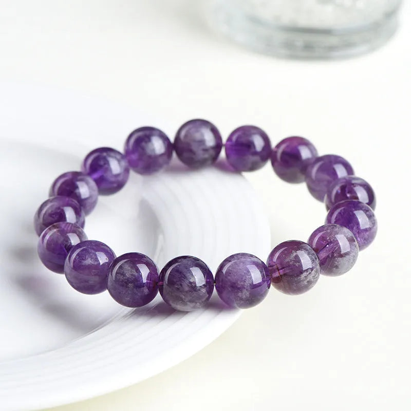 Natural feather amethyst crystal bracelet with Snow Mountain purple scattered beads and Ruyi design.