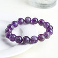 Natural feather amethyst crystal bracelet with Snow Mountain purple scattered beads and Ruyi design.