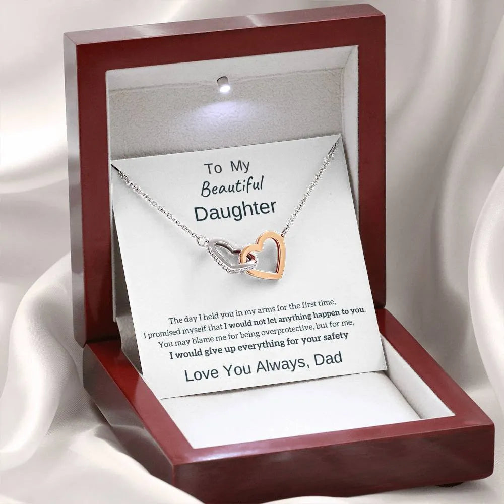 Double heart copper pendant with two-colour peach finish on white background