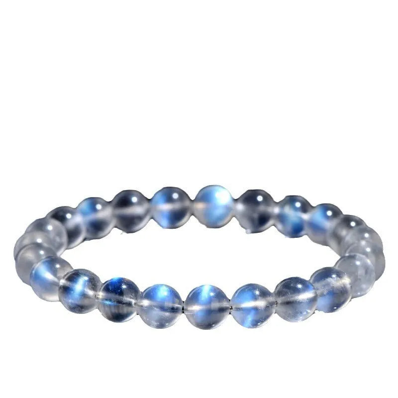 Natural cream body crystal bracelet on wrist showing smooth ground beads.