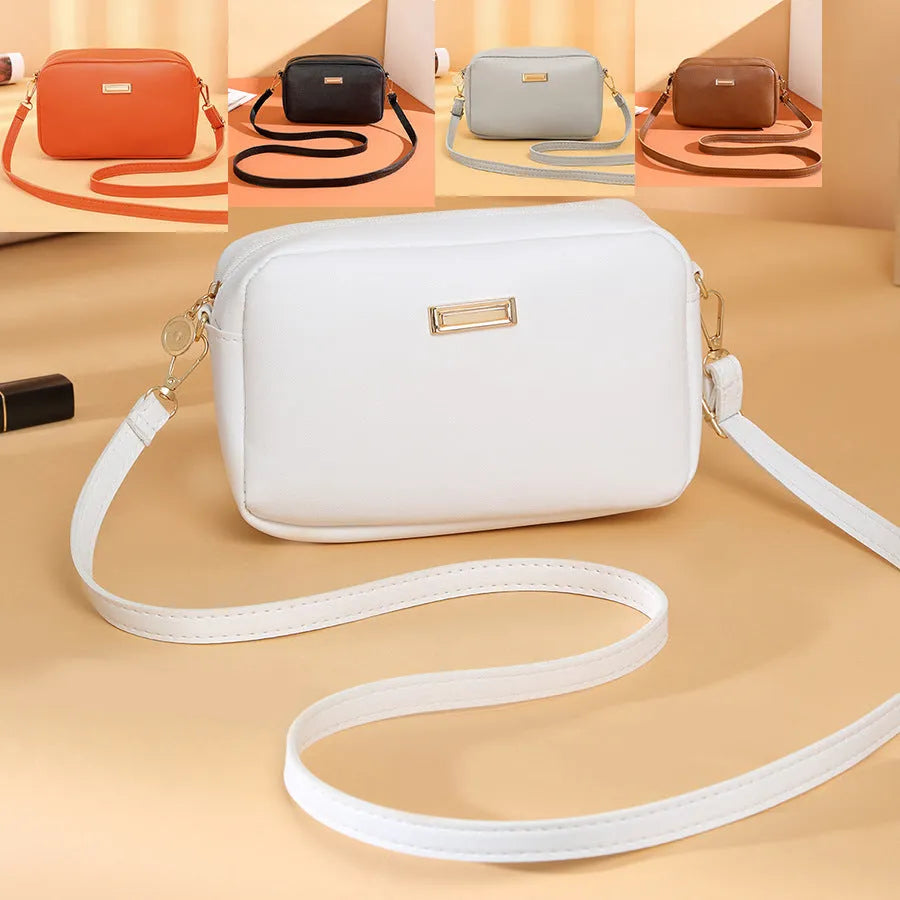 PU ladies' shoulder bag in solid colour with three-dimensional pocket and urban simplicity design