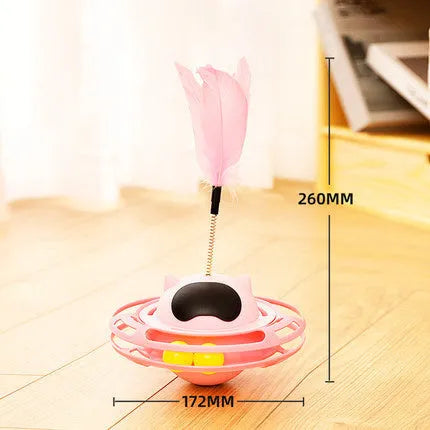 Pink cat tumbler turntable toy measuring 17 cm by 10 cm on a flat surface