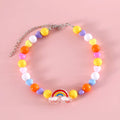 Colourful plastic bead necklace for cats in peach, rainbow, or small flower patterns with adjustable XS or S sizing